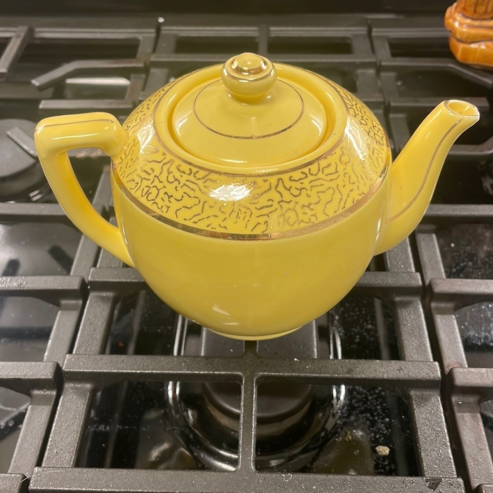 MCM Halls pottery teapot. Small chip on nose some fading on design.